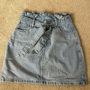 Light wash denim miniskirt with belt from H&M. Size 4.